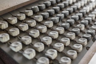 Details of an old keyboard on industrial machine of the late nineteenth century