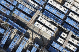 Drone aerial top view.photo of abandoned transport Blue buses parking. shabby and broken vehicle.