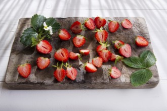 Small pieces of strawberries for the preparation of salad
