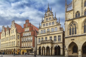 Prinzipalmarkt is historic street with buildings with picturesque pediments attached to one another