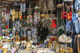 The famous flea market in Jaffa. Israel. Garden decorations with jingle bells. Bright multi-colored