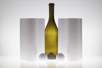 Symmetry abstract Paper Background with glass and golf balls on a glass table
