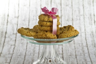 Delicious biscuits on a decorative background