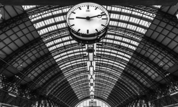 Germany, 07 23 2018: Clock hanging at the main railway station, Europe