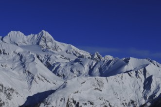 Panoramic mountain view of the Grossglockner Snow mountain range in East Tyrol from the Adler