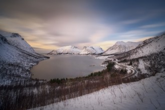 Beautiful winter landscape scene, sunset or sunrise in mountains and fjords