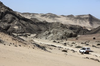 Tourist safari near Swakopmund, Namib Desert, Namibia, Africa Namib is the oldest desert on earth