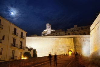 Eivissa Ibiza town with night moon castle entrance and Church