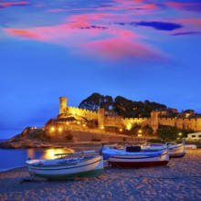 Tossa de Mar sunset in Costa Brava of Catalonia spain Castle and beach