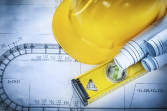 Building helmet construction level plans on blueprint