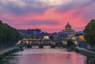 Sunset view of St. Peter's Basilica, Ponte Sant'Angelo, and Tiber River in Rome, Italy, Europe