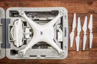 FORT COLLINS, CO, USA - DECEMBER 11, 2016: DJI Phantom 4 pro quadcopter drone in a custom case on a