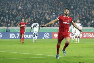 Vincenzo Grifo (SC Freiburg) scores from the penalty spot to make it 2-0 at the break and