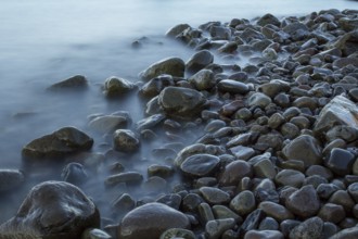 Time exposure of stones in the Westfjords coast, Iceland, Europe