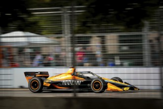 PATO OWARD (5) of Monterey, Mexico runs through the streets during the Honda Indy Toronto in