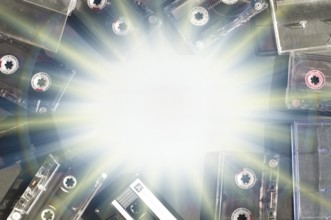 Old fashioned audio tape cassettes background. Text space in center