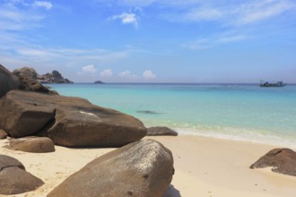 Similan Islands, Andaman Sea, Thailand. Finest white sand beach adjacent to the great brown cliffs