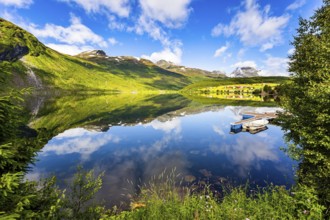 The lovely clean and calm lake Eidsvatnet. Warm sunny day in July. Summer trip to Norway. Northern