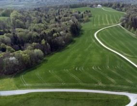 Idyllic, agricultural landscape in Upper Bavaria, farm in a secluded location, drone shot, Upper
