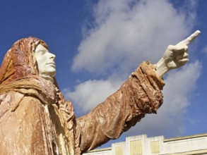 One of the three kings shows the way, coloured statue in Portugal