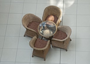 Table with four chairs in coffee place