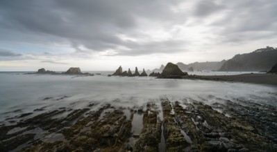 A long expiosure view of the Playa de Gueirua beach on the Costa Verde of Asturias