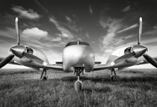 sports plane against a cloudy sky