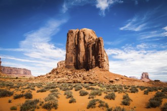 Complementary colours blue and orange in this iconic view of Monument Valley, USA, North America