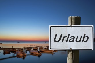 Sign with the inscription Urlaub an der K
