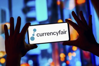 In this photo illustration, the CurrencyFair logo is displayed on a smartphone screen