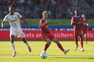 Football match, Jordy MAKENGO SC Freiburg left in a duel for the ball with Leonardo SCIENZA 1. FC