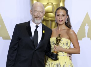 Alicia Vikander and J.K. Simmons at the 88th Annual Academy Awards, Press Room held at the Loews