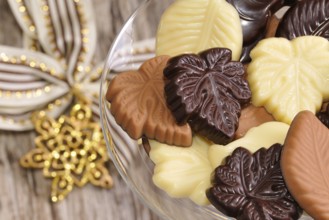 Chocolate leaves with decoration. Different types of chocolate