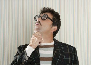 Nerd silly crazy myopic glasses man funny gesture mustache tacky retro