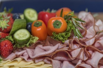 Healthy cold platter with a variety of food, fruit and vegetables