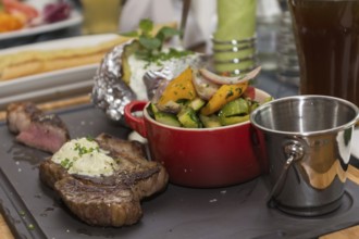 Medium roasted meat with vegetables and other ingredients, Austria, Europe