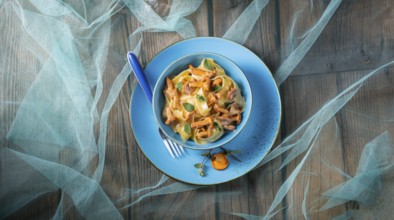 Pappardelle with cheese sauce and fresh chanterelles