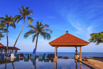 Rest of the Andaman Sea. Popular resort on the island of Koh Samui. Pool surrounded by palm trees