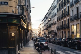 Madrid, Spain, 26 September 2020: Argensola street at sunset. Street scene in central Madrid,
