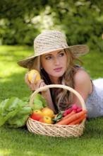 Fruit and vegetables in a basket with Mrs Austria