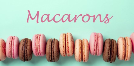 Macarons concept. Letters macarons on turquose bright bacground and row of french macarons