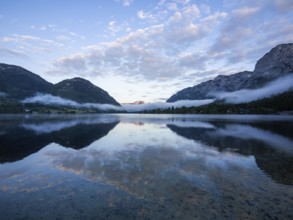 Morning fog over the lake, reflection, Grundlsee, Salzkammergut, Styria, Austria, Europe