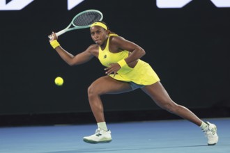 American tennis player Coco Gauff (USA) playing a forehand shot at the Australian Open 2025
