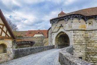 Town gate Spitalbastei or Spitalbastion, covered bridge, Rothenburg ob der Tauber, district of