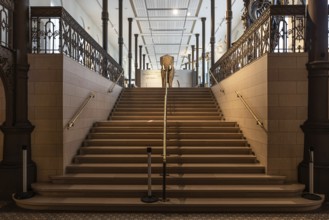 Brussels Capital Region, Belgium, 03 19 2022, Symmetric munumental staircase at the museum for