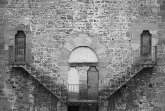 Exterior of antique building with Escher architecture style. Simmetry and geometric perspective