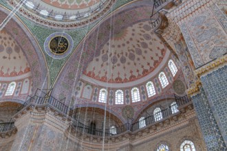 A picture of the colorful and gorgeous interior of the New Mosque, in Istanbul
