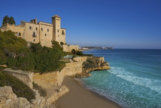 Cala La Jovera beach under Tamarit castle in Tarragona of Catalonia