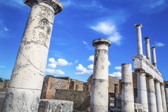 Pompeii in Italy, ruins of the antique Temple of Apollo with bronze Apollo statue, Naples
