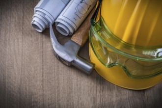 Claw hammer safety goggles construction drawings and hard hat
